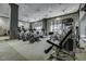 Fitness center with various exercise equipment at 3040 Peachtree Rd # 802, Atlanta, GA 30305