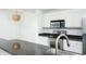 Modern kitchen with stainless steel appliances and granite countertops at 3040 Peachtree Rd # 802, Atlanta, GA 30305