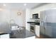 Modern kitchen with stainless steel appliances and granite countertops at 3040 Peachtree Rd # 802, Atlanta, GA 30305