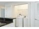 In-unit laundry with washer and dryer at 3040 Peachtree Rd # 802, Atlanta, GA 30305