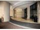 Elegant building entrance with seating and modern design at 3040 Peachtree Rd # 802, Atlanta, GA 30305