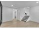 Finished basement features an open layout, new flooring, and a bathroom at 1770 Austin Dr, Decatur, GA 30032
