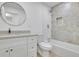 Modern bathroom with white vanity, toilet and bathtub at 1770 Austin Dr, Decatur, GA 30032