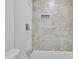 Updated bathroom with a patterned tile shower and new vanity at 1770 Austin Dr, Decatur, GA 30032
