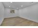 Spacious bedroom with hardwood floors and a large window at 1770 Austin Dr, Decatur, GA 30032