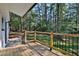 Newly built deck overlooks a private wooded backyard at 1770 Austin Dr, Decatur, GA 30032