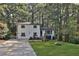 Charming white brick home with a tree-lined yard at 1770 Austin Dr, Decatur, GA 30032