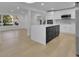 Modern kitchen with white shaker cabinets, large island, and quartz countertops at 1770 Austin Dr, Decatur, GA 30032