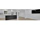 Open concept kitchen and dining area with modern finishes and hardwood floors at 1770 Austin Dr, Decatur, GA 30032