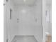 Large walk-in shower with glass enclosure and patterned tile floor at 1770 Austin Dr, Decatur, GA 30032