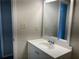 Simple bathroom with white vanity and mirror at 470 Ovara Ct, Stone Mountain, GA 30088