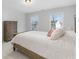 Spacious bedroom with neutral decor and plenty of natural light at 2133 Kirkham Way, Kennesaw, GA 30152