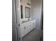 Bathroom boasts double vanity and white cabinets at 2953 Evanshire Ave, Duluth, GA 30096