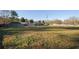 A vast backyard featuring a large grassy expanse and perimeter fencing, ideal for versatile outdoor use at 331 Wages Rd, Auburn, GA 30011
