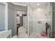 Bathroom featuring a glass shower, tiled flooring, and vanity area at 331 Wages Rd, Auburn, GA 30011