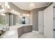 Bathroom with a large vanity, marbled tile, and modern lighting at 331 Wages Rd, Auburn, GA 30011