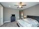 Comfortable bedroom features a ceiling fan, plush carpet, and a neutral color scheme at 331 Wages Rd, Auburn, GA 30011