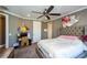 Inviting bedroom with a comfortable bed, plush carpet, neutral gray walls, and ample natural light at 331 Wages Rd, Auburn, GA 30011