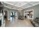 Open-concept living room seamlessly connected to the kitchen and foyer at 331 Wages Rd, Auburn, GA 30011