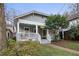 Gray craftsman home with a large front porch at 713 United Se Ave, Atlanta, GA 30312