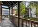 Balcony with view of trees and town buildings at 9060 Selborne Ln, Chattahoochee Hills, GA 30268