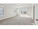 Spacious bedroom with neutral carpet, three windows allowing ample natural light at 4235 Holland Grove Rd, Lawrenceville, GA 30044