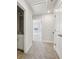 Hallway with multiple rooms and carpeted floors at 4235 Holland Grove Rd, Lawrenceville, GA 30044