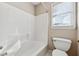 Bathroom with shower/tub combo and toilet at 5140 Sunset Maple Trl, Lilburn, GA 30047