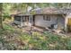 House exterior showcasing patio and sunroom at 778 Villa Way, Jonesboro, GA 30238