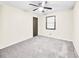 Spacious bedroom with gray carpet and ceiling fan at 778 Villa Way, Jonesboro, GA 30238