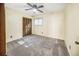 Bright bedroom with ceiling fan and large closet at 778 Villa Way, Jonesboro, GA 30238