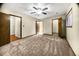Large bedroom with ceiling fan and access to other rooms at 778 Villa Way, Jonesboro, GA 30238