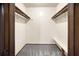 Walk-in closet with double rods and shelving at 778 Villa Way, Jonesboro, GA 30238