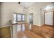 Bright dining room featuring hardwood floors and a chandelier at 778 Villa Way, Jonesboro, GA 30238