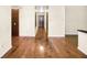 Bright hallway with hardwood floors leading to bedrooms and other rooms at 778 Villa Way, Jonesboro, GA 30238