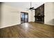 Living room with hardwood floors and sliding glass doors at 778 Villa Way, Jonesboro, GA 30238