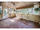 Screened sunroom with brick flooring at 778 Villa Way, Jonesboro, GA 30238