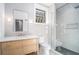 Modern bathroom with a frameless glass shower and floating vanity at 110 Maryeanna Dr, Atlanta, GA 30342