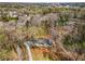 A beautiful aerial view of the home nestled among lush greenery and mature trees at 110 Maryeanna Ne Dr, Atlanta, GA 30342