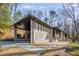 Charming exterior view showcases a covered carport and unique landscaping at 110 Maryeanna Ne Dr, Atlanta, GA 30342
