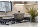 Modern kitchen details include white countertops, subway tiles, and gas cooktop at 110 Maryeanna Ne Dr, Atlanta, GA 30342