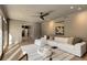 Open living space with a sectional sofa, light-filled windows, and neutral decor at 110 Maryeanna Ne Dr, Atlanta, GA 30342