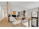 Bright living room featuring wood floors, a fireplace, and modern furniture at 110 Maryeanna Ne Dr, Atlanta, GA 30342