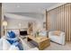 Bright living room with modern furniture, wood accent wall, and open concept design at 110 Maryeanna Ne Dr, Atlanta, GA 30342