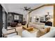 Inviting living room with modern fireplace, neutral tones, and open concept layout to the kitchen at 110 Maryeanna Ne Dr, Atlanta, GA 30342