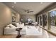 Cozy living room boasting a comfortable sectional sofa and light-filled windows at 110 Maryeanna Ne Dr, Atlanta, GA 30342