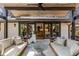 Covered patio featuring comfortable seating and an open view to the interior at 110 Maryeanna Ne Dr, Atlanta, GA 30342