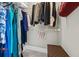 Walk-in closet with ample hanging space and a variety of clothing items at 560 Dutch Valley Ne Rd # 209, Atlanta, GA 30324