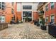 Community courtyard featuring patio seating and garden features at 560 Dutch Valley Ne Rd # 209, Atlanta, GA 30324