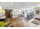 Hallway features hardwood floors, modern lighting, and neutral color palette at 560 Dutch Valley Ne Rd # 209, Atlanta, GA 30324
